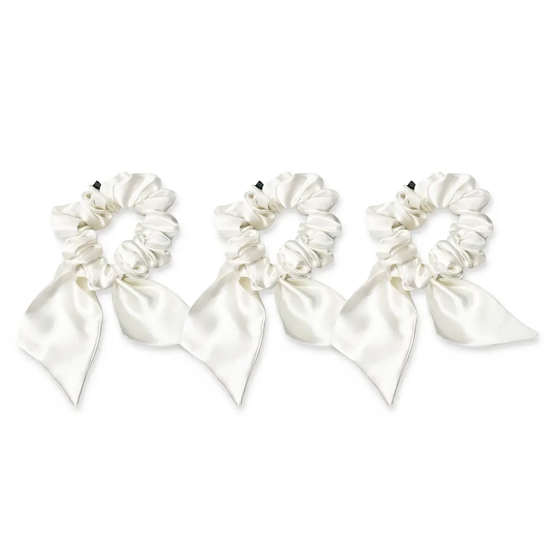 silkeep-svilene-bele-midi-gumice-sa-masnicom-3cm-3kom.webp 100% Svilene Bele Midi Gumice sa Mašnicom 3cm (3 kom) - Слика 1